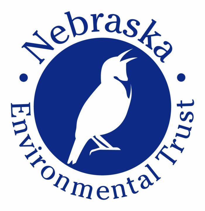 blue and white Nebraska Environmental Trust seal with a bird in the middle of the circle